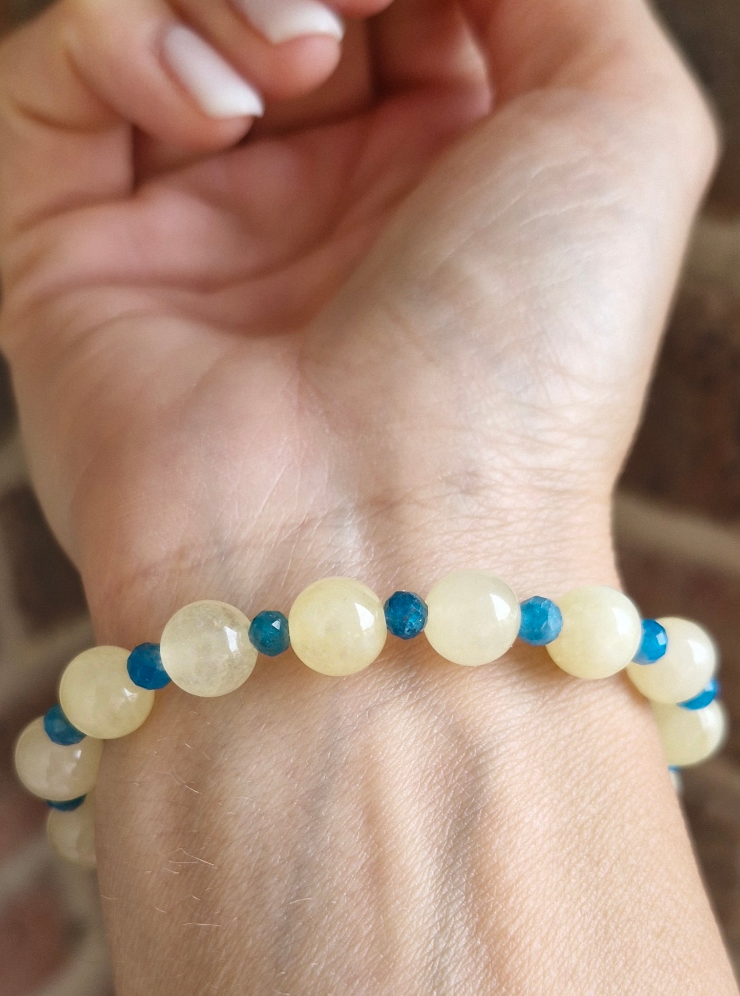 Handmade Citrine and Apatite gemstone stretch bracelet styled with casual outfit