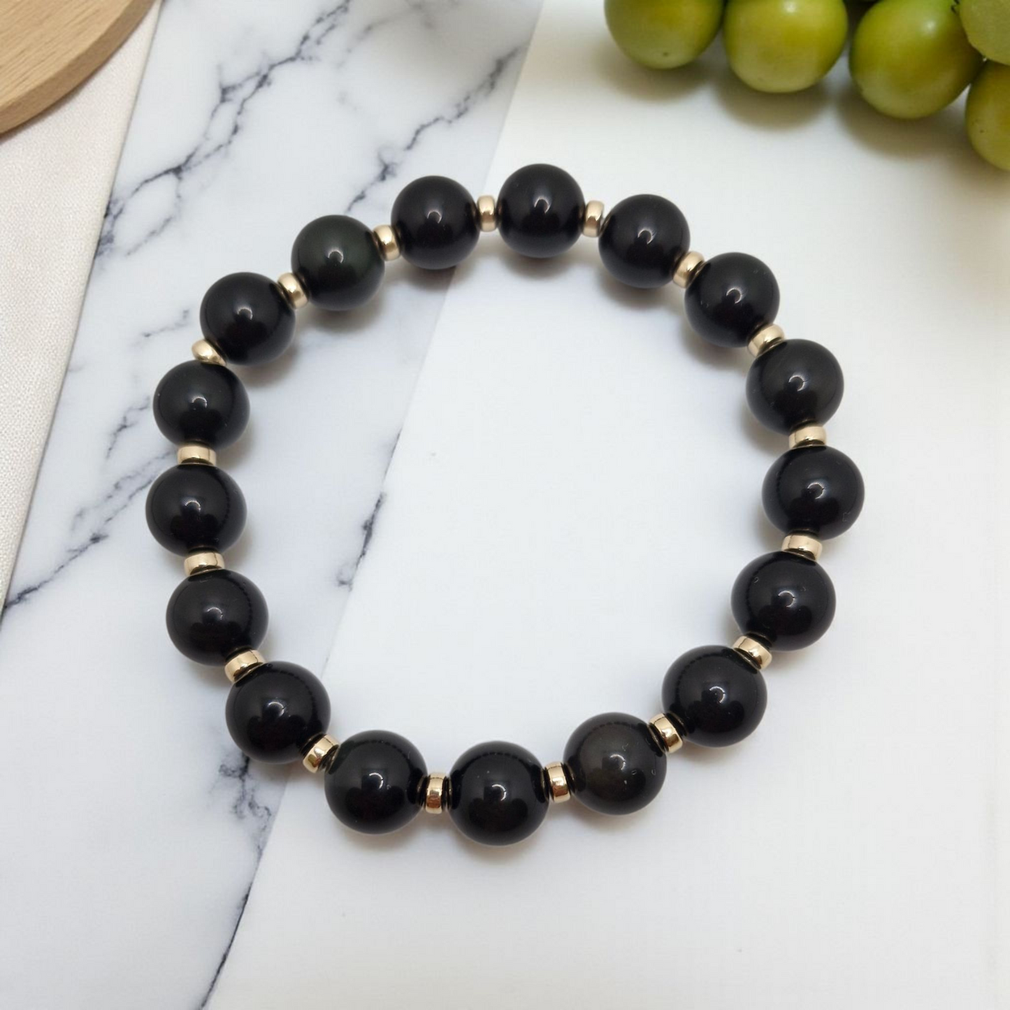Natural Black Obsidian bracelet accented with durable 4mm Gold Filled rondelle bead, lightweight and comfortable.