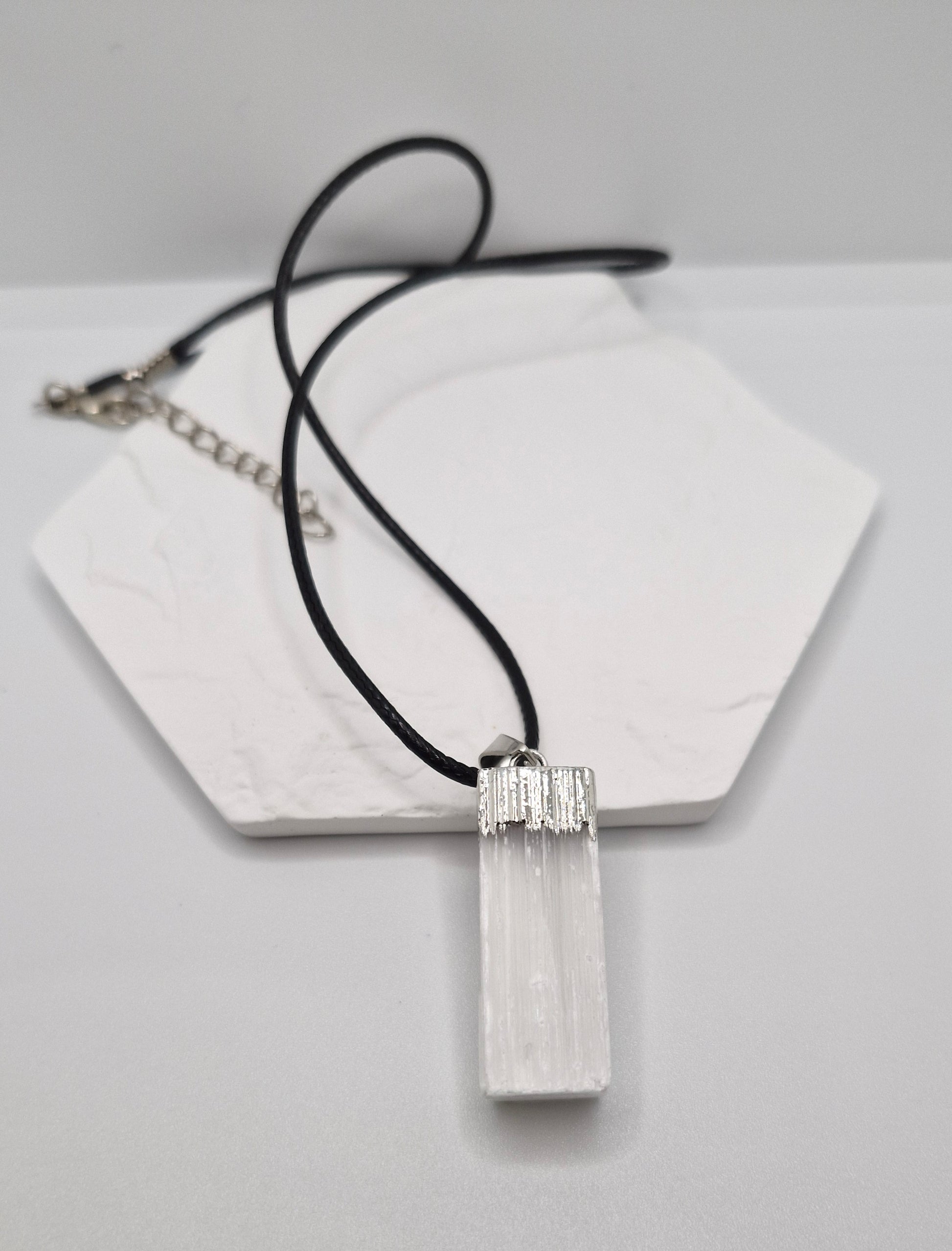 Handmade rectangular Selenite pendant necklace with black cord, minimalist crystal jewellery for meditation.