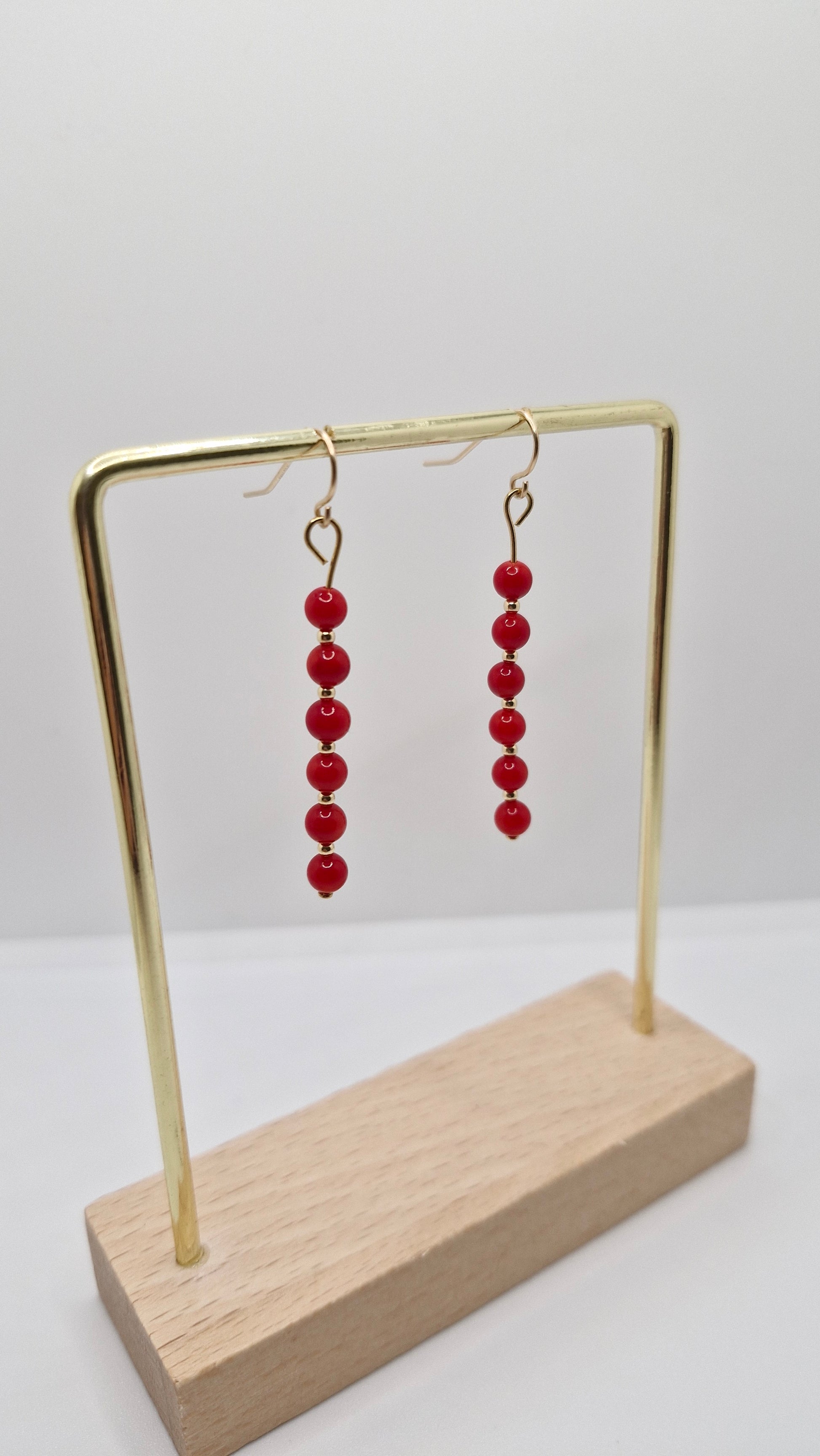 Handmade red coral earrings with 4mm dyed coral beads, 2mm gold-filled balls, and gold-filled hooks