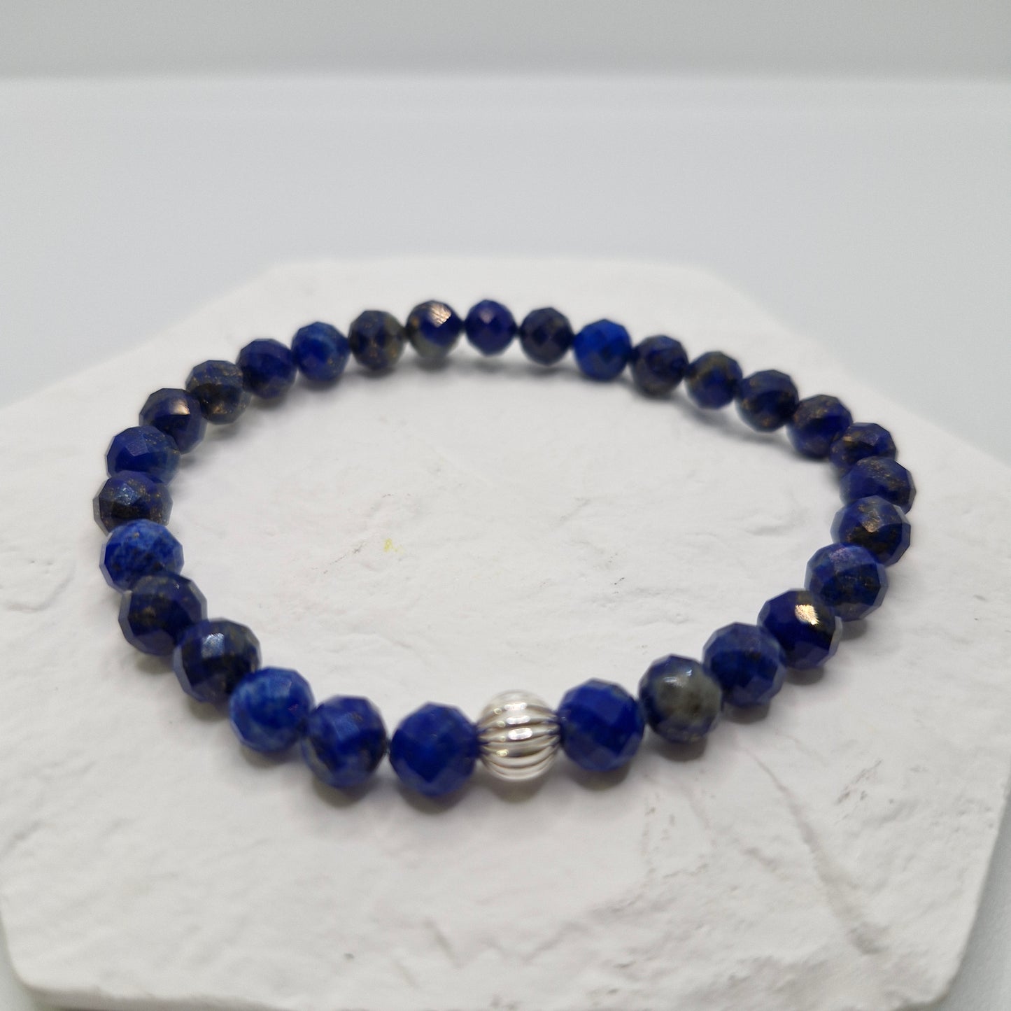 Faceted Lapis Lazuli stretch bracelet with sterling silver accent bead, handmade spiritual and healing gemstone jewelry