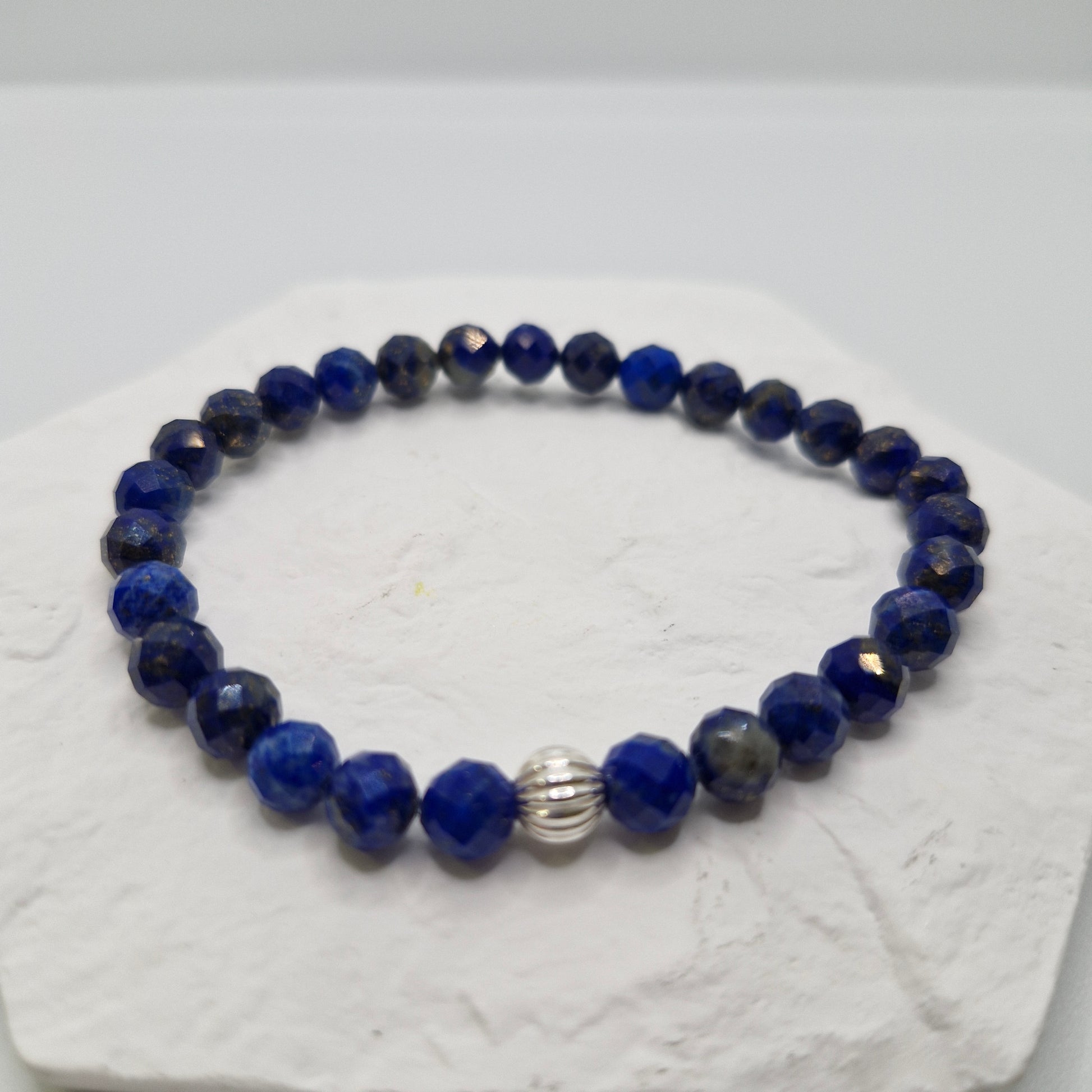 Faceted Lapis Lazuli stretch bracelet with sterling silver accent bead, handmade spiritual and healing gemstone jewelry