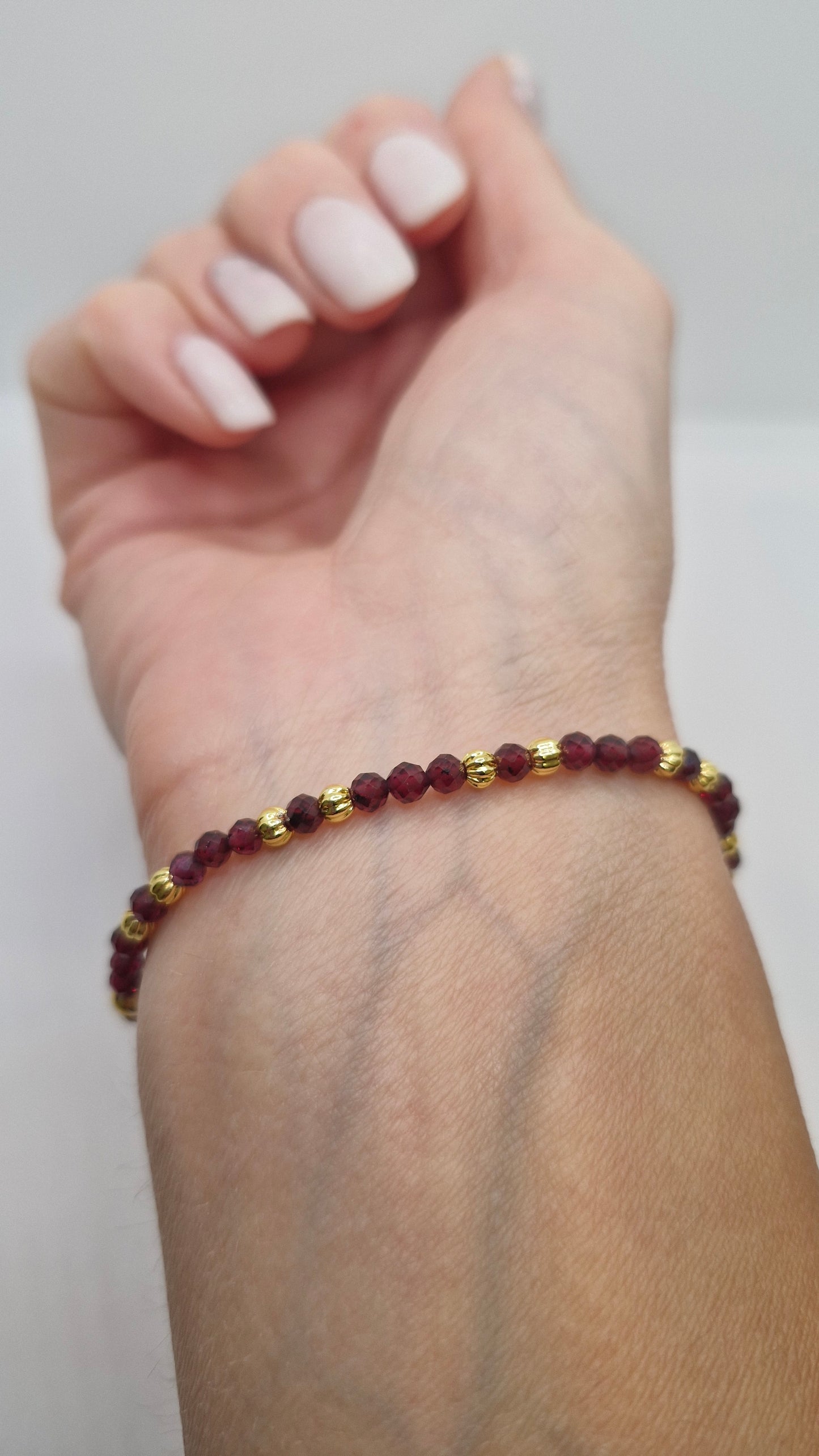 Garnet stretch bracelet with 3mm gold plated plain bead, handmade gemstone jewellery 