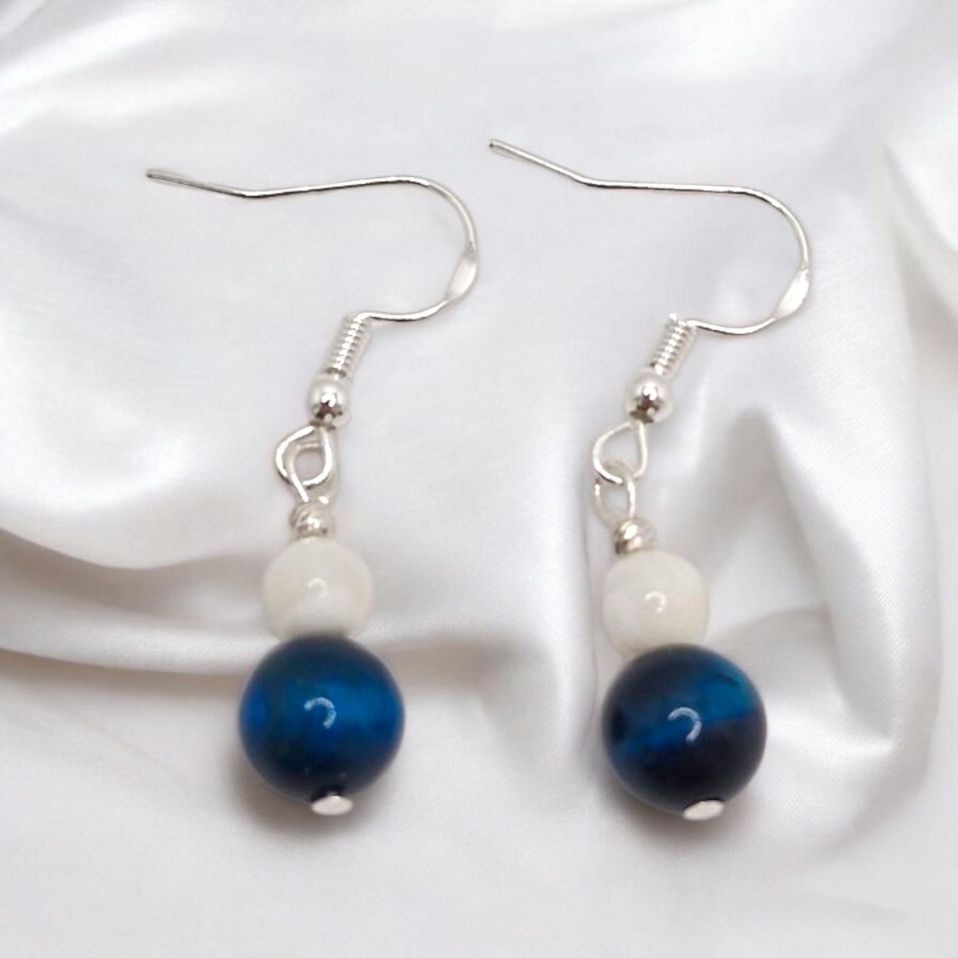 Handmade Mother of Pearl and Blue Tiger Eye earrings with sterling silver and stainless steel accents