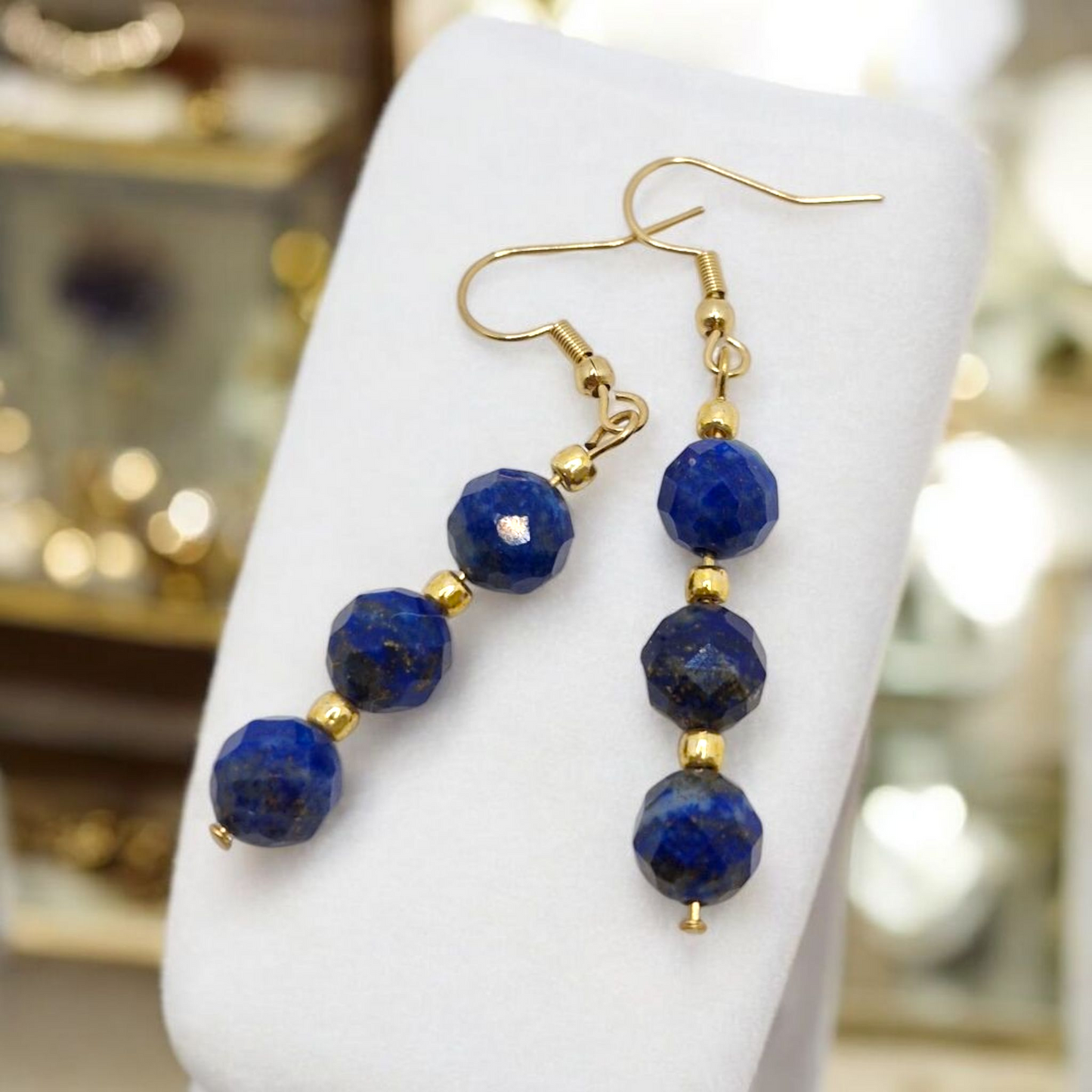 Elegant faceted 8mm Lapis Lazuli earrings with shimmering Toho accents, handmade with gold-plated stainless steel hooks – statement gemstone jewellery