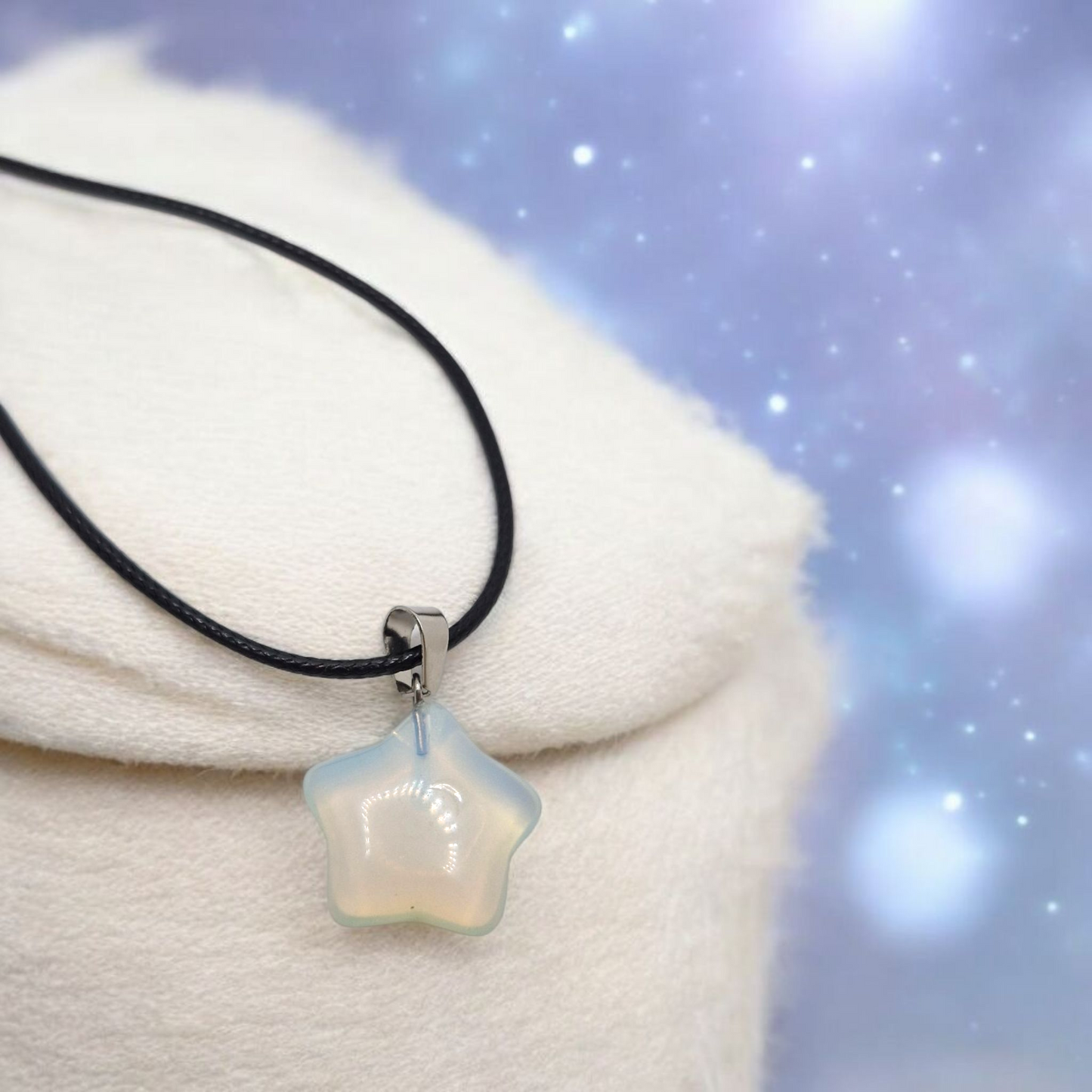 20mm man-made Opalite star pendant glowing with soft blue hues, minimalist spiritual necklace