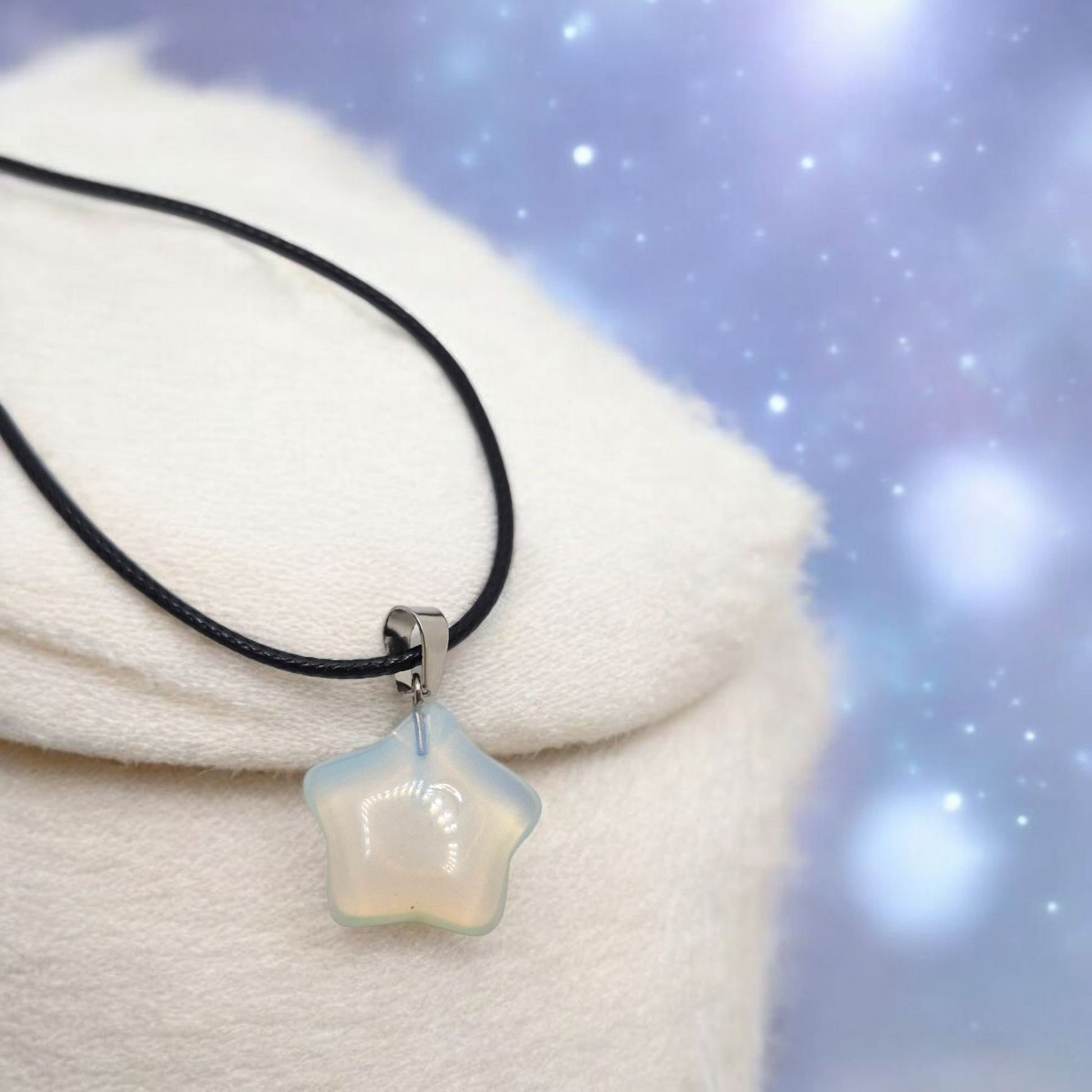 20mm man-made Opalite star pendant glowing with soft blue hues, minimalist spiritual necklace