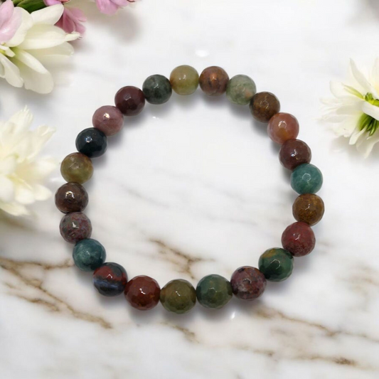 Faceted Indian Agate 8mm stretch bracelet with natural multicolor gemstones symbolizing balance and strength.