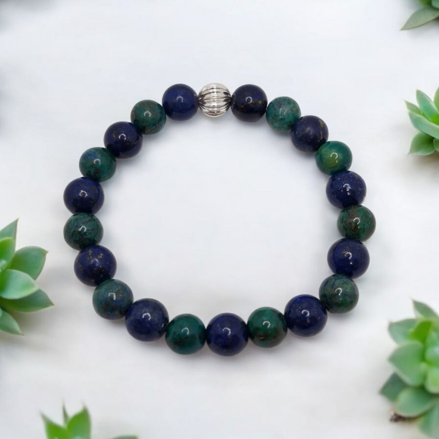 Lapis Lazuli and Green Chrysocolla 8mm gemstone bracelet with sterling silver corrugated accent bead on stretch cord.
