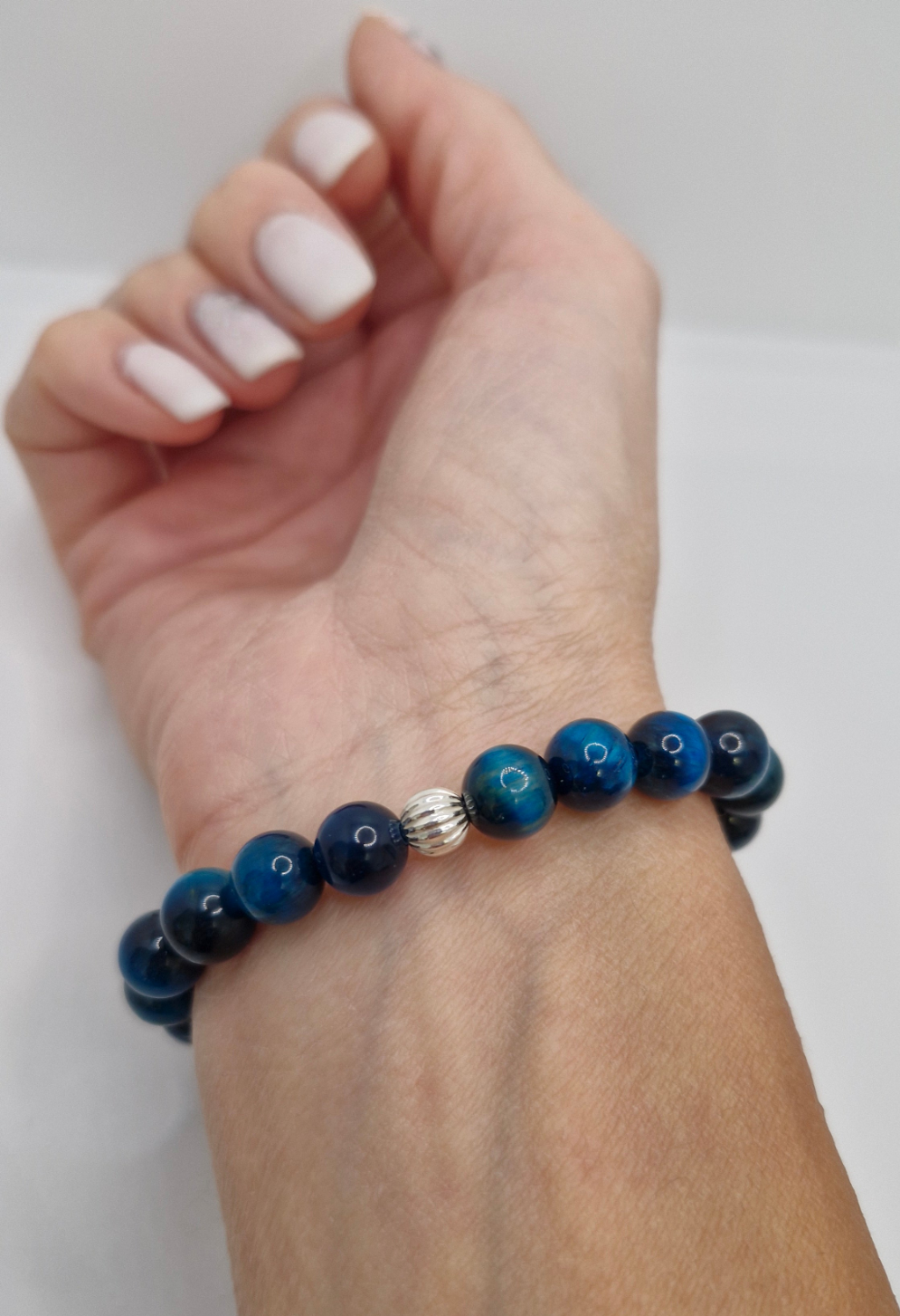 Elegant unisex Blue Tiger Eye bracelet promoting clarity, confidence, and balance