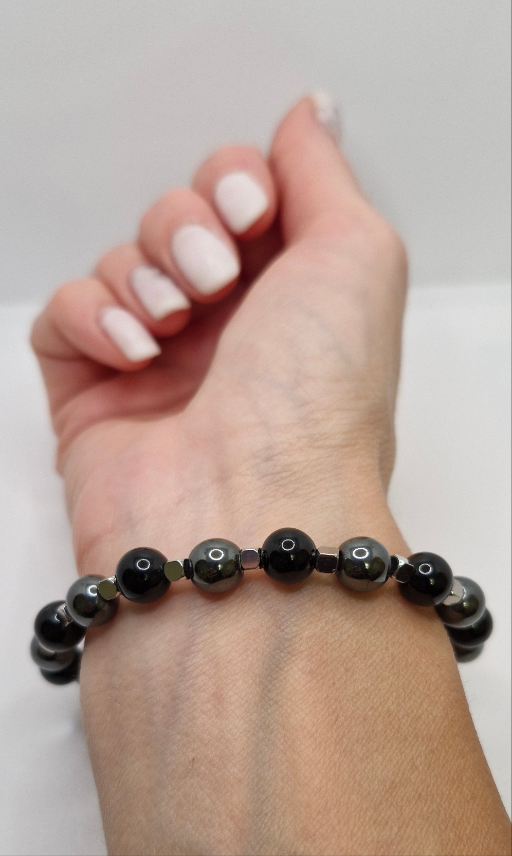 Elegant unisex bracelet for grounding, protection, and emotional balance with natural gemstones