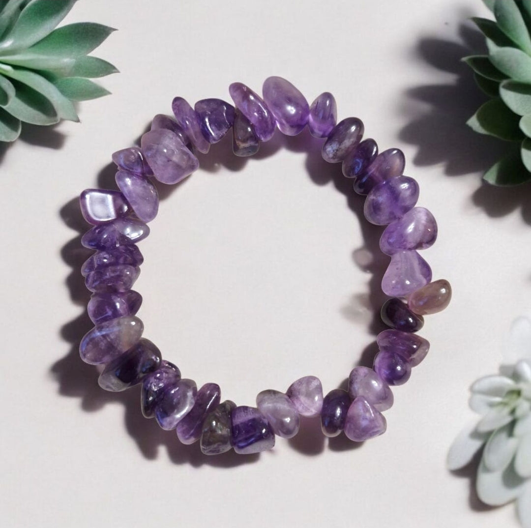 Amethyst bead in chakra bracelet supporting calm, clarity, and spiritual energy