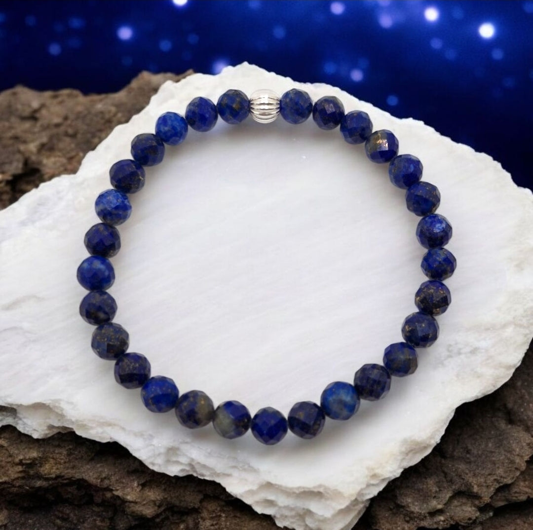 Handmade blue gemstone bracelet with faceted Lapis Lazuli beads and silver accent, meaningful chakra jewelry