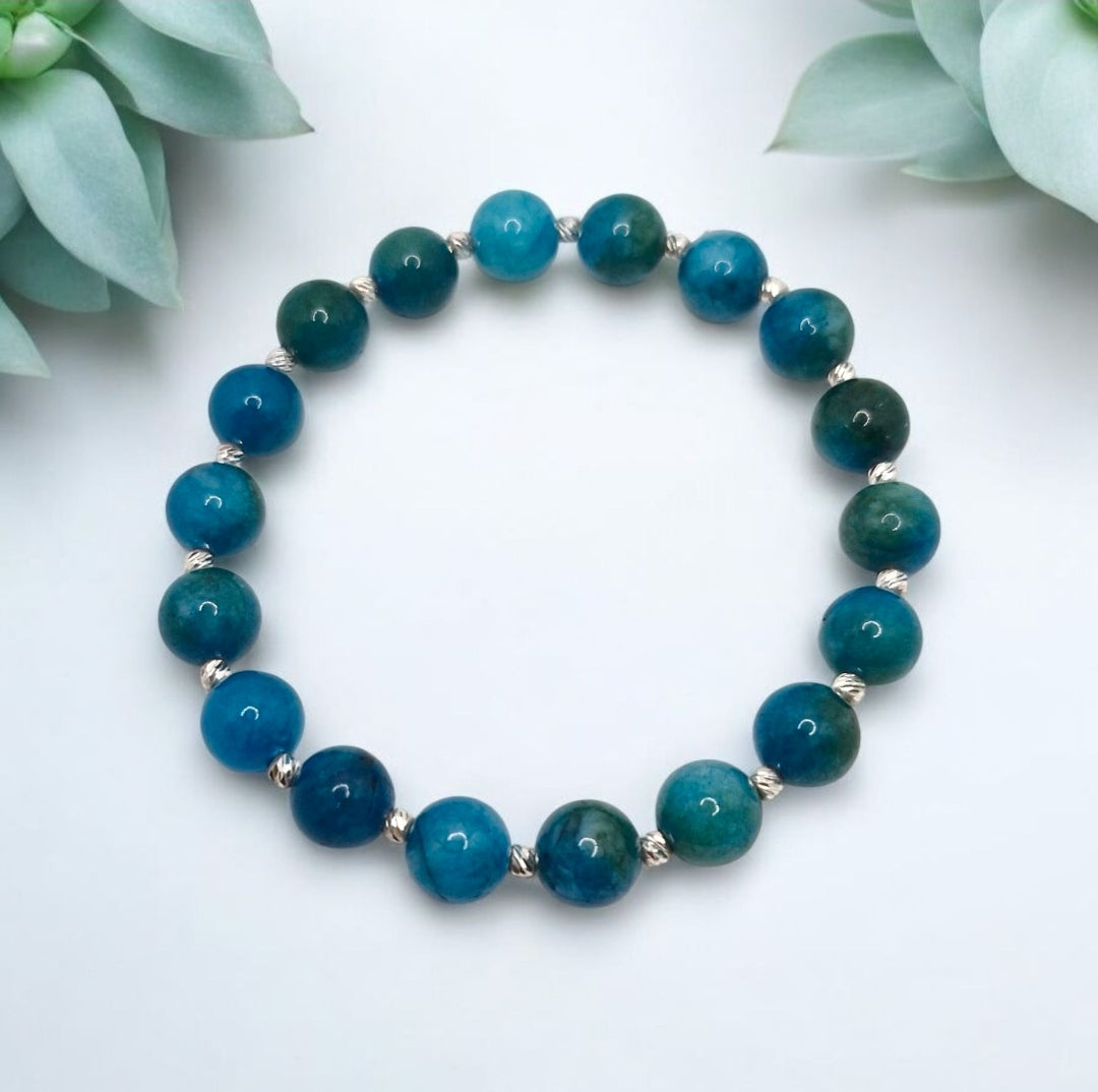 Handmade Blue Apatite gemstone bracelet featuring 8mm beads and sterling silver corrugated spacers.