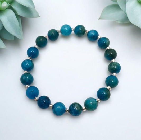 Handmade Blue Apatite gemstone bracelet featuring 8mm beads and sterling silver corrugated spacers.
