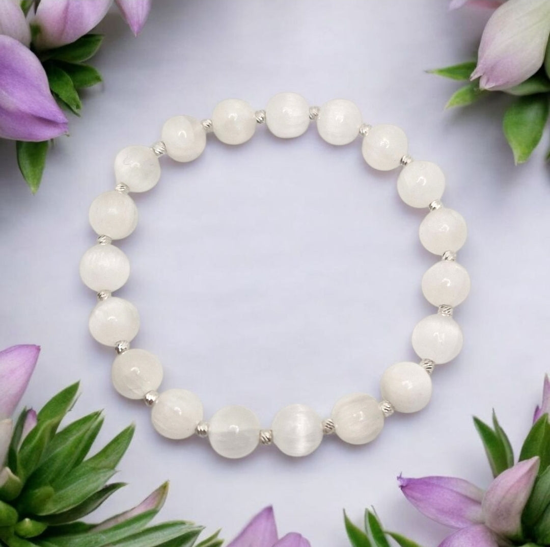 Handmade Selenite gemstone bracelet paired with casual outfit, accented with sterling silver beads