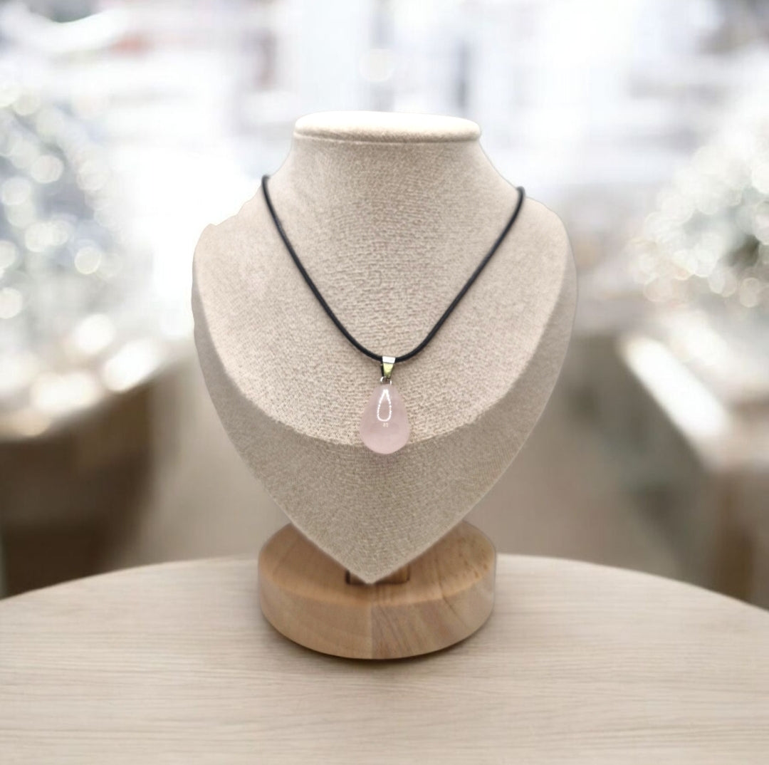 Handmade rose quartz teardrop pendant on black rope necklace, natural pink gemstone for love, compassion and healing energy.