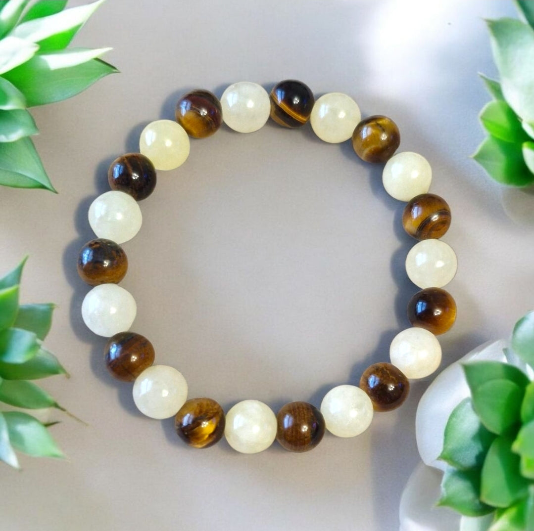 Handmade crystal bracelet featuring golden citrine and tiger eye, 8mm beads for wealth, protection, and positive energy