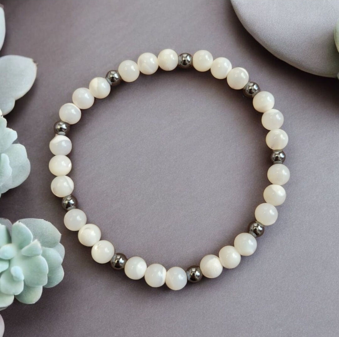 Handmade elastic stretch bracelet with Grade A Japanese Mother of Pearl and Grey Hematite beads