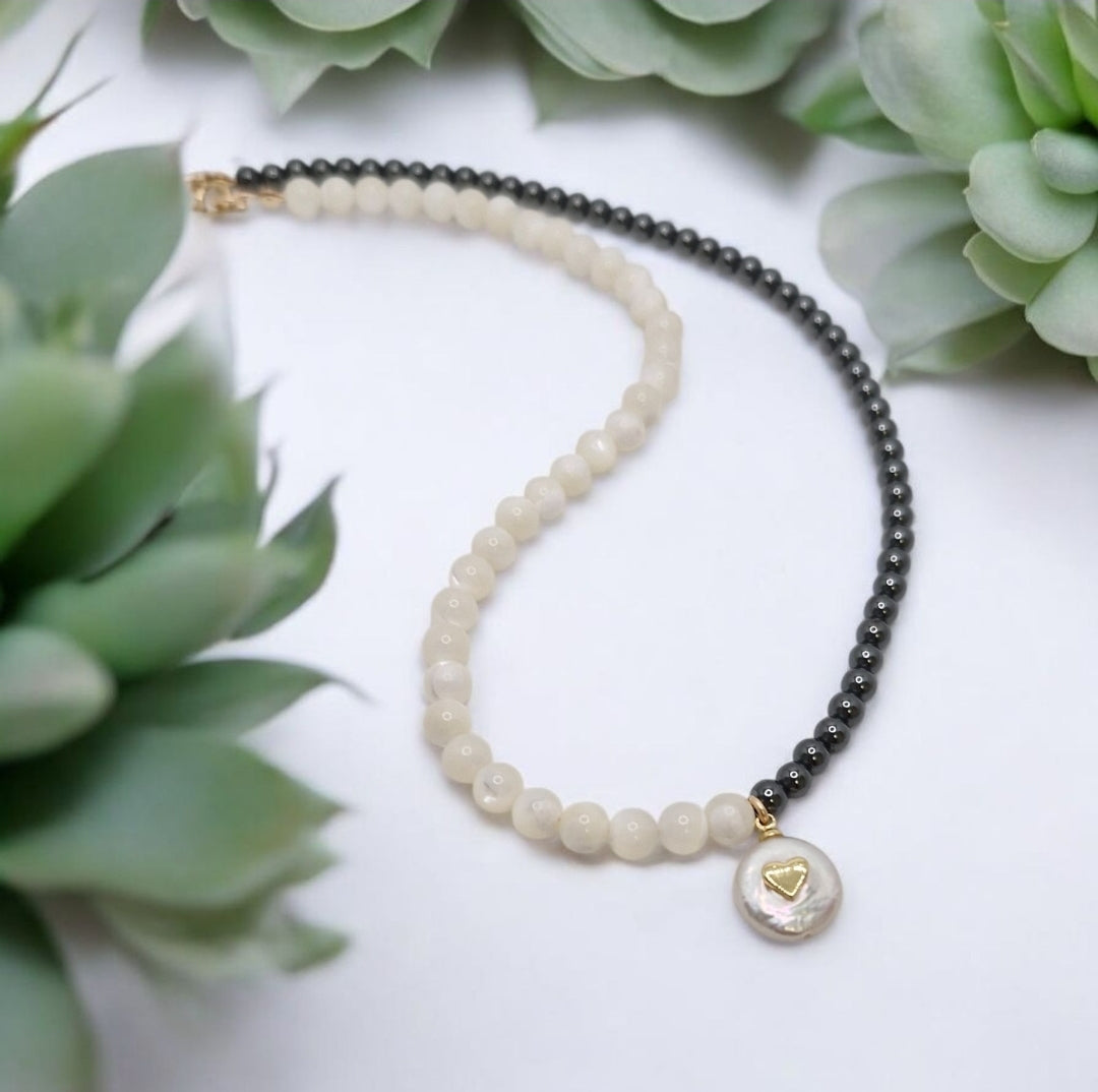 Elegant heart-shaped freshwater pearl pendant on Mother of Pearl and Hematite bead necklace
