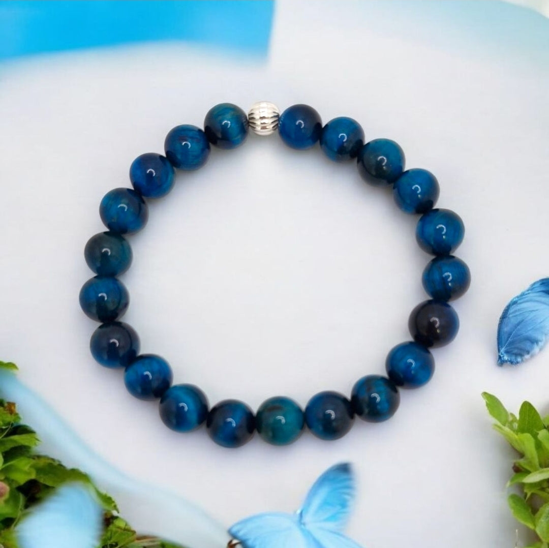Close-up of 6mm sterling silver corrugated accent bead on Blue Tiger Eye bracelet