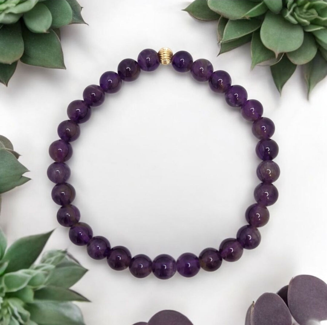 Grade A Brazilian Amethyst bracelet with gold filled accent bead, handmade stretch design
