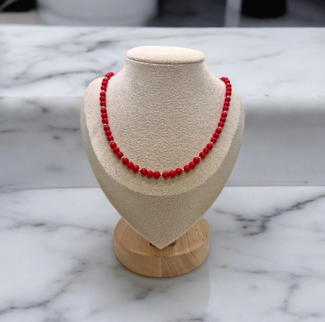 Heart-shaped pendant clasp on Red Bamboo Coral necklace, versatile two-way design