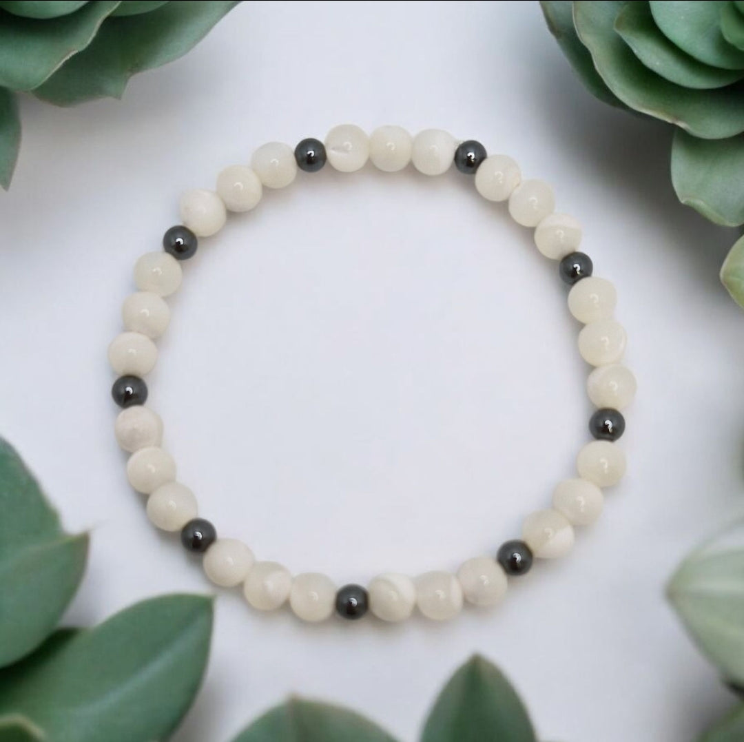 Elegant Mother of Pearl and Hematite bracelet for grounding, harmony, and emotional balance