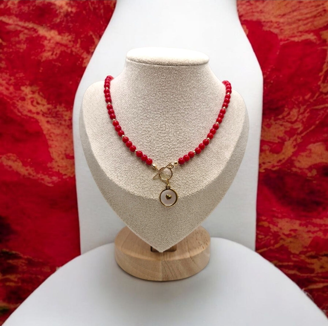 Handmade Red Bamboo Coral necklace with 4mm beads, gold filled accents, and heart pendant