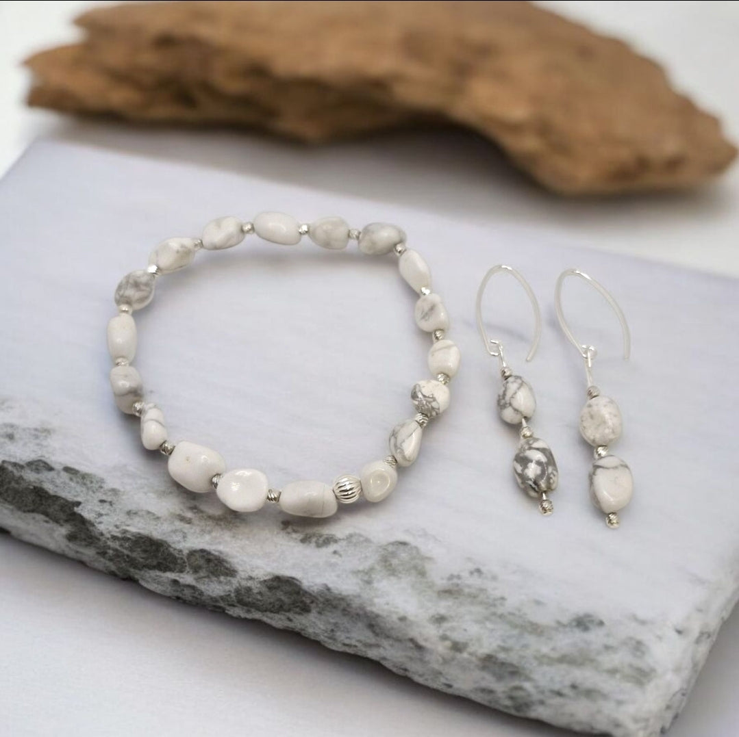 Close-up of Howlite bracelet with sterling silver beads and matching earrings