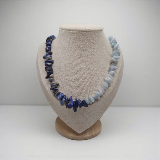 Video of aquamarine and lapis lazuli chip necklace worn on neck, showing stainless steel S-hook clasp.
