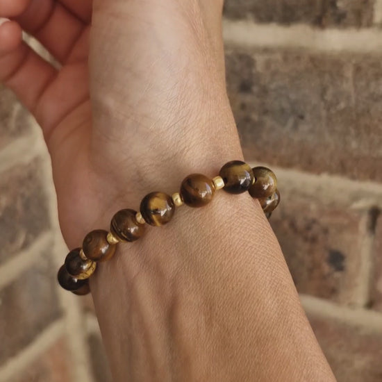 Close-up video showcasing Tiger Eye beaded bracelet with Toho glass details, handmade crystal jewellery