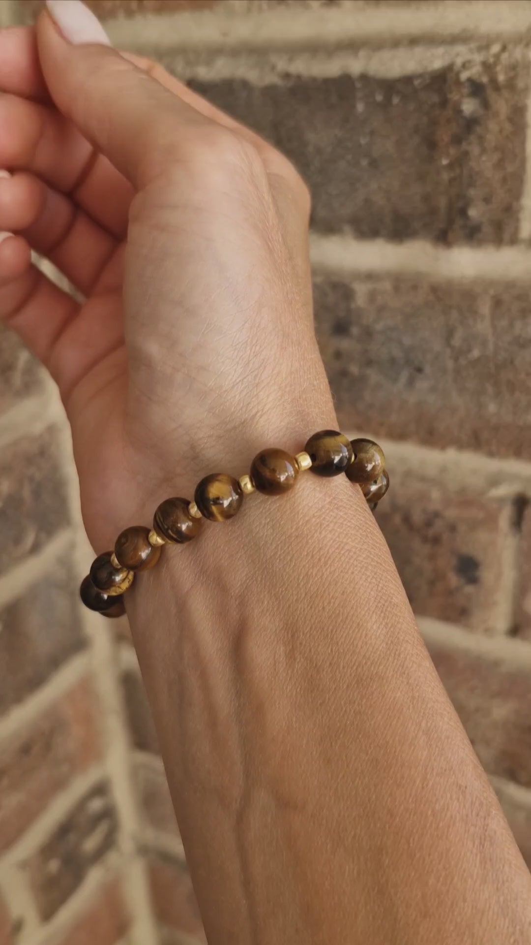 Close-up video showcasing Tiger Eye beaded bracelet with Toho glass details, handmade crystal jewellery