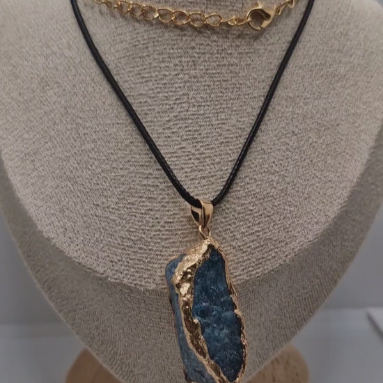 Video showing boho blue apatite pendant on 1.5mm black waxed rope necklace, with free selenite strip