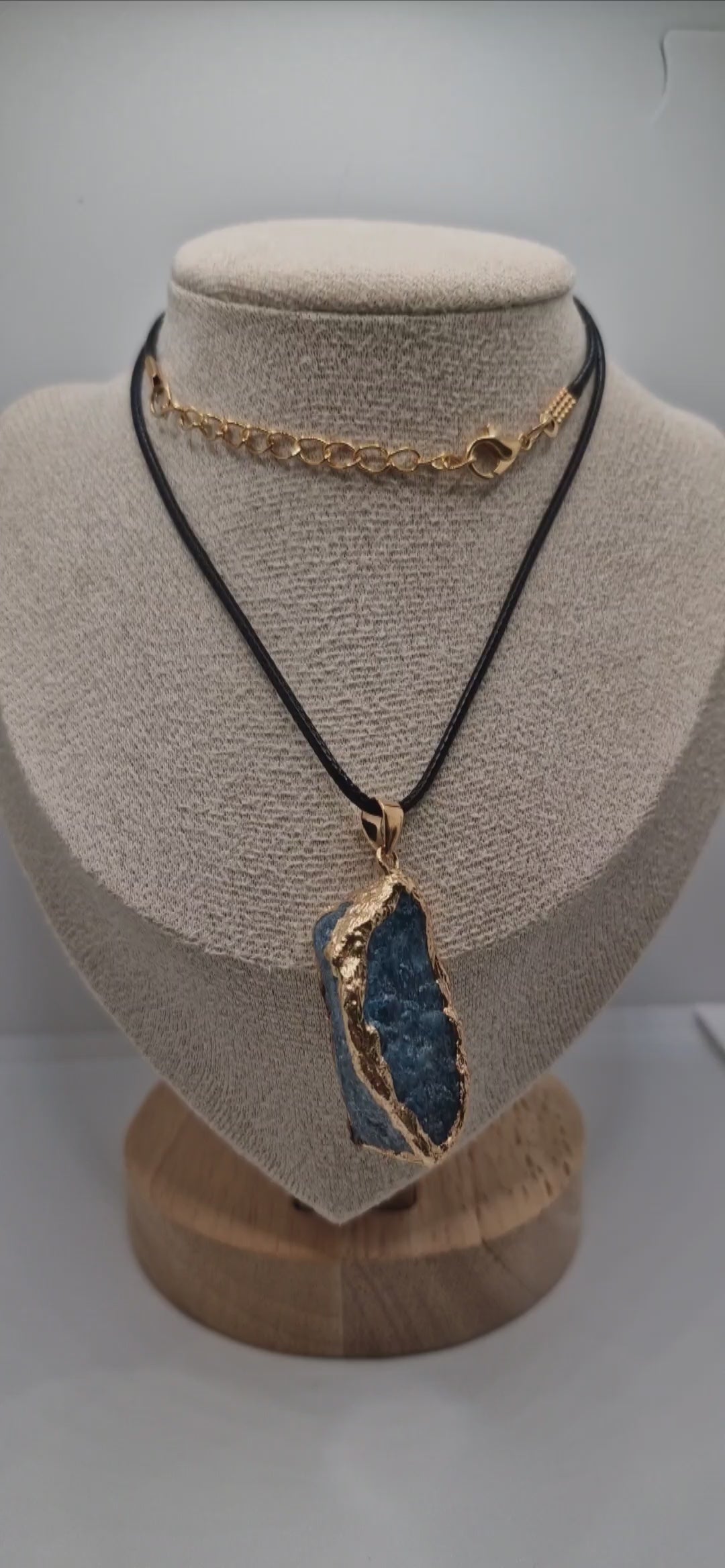 Video showing boho blue apatite pendant on 1.5mm black waxed rope necklace, with free selenite strip