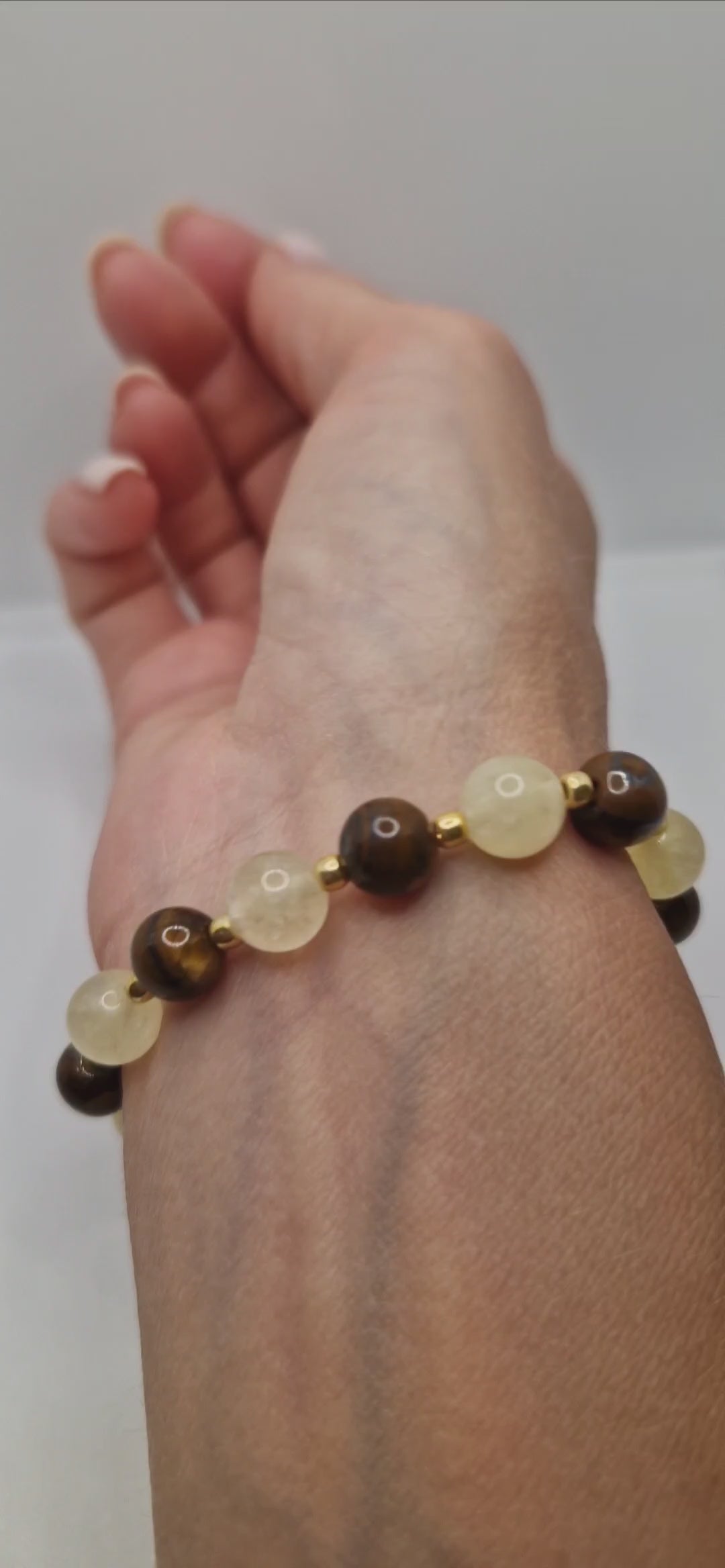 Close-up of 8mm Citrine & Tiger Eye stretch bracelet highlighting natural gemstones and Toho bead accents