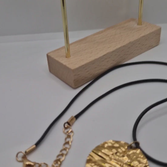 Demonstration of adjustable 1.5mm black waxed rope pendant necklace with matching earrings