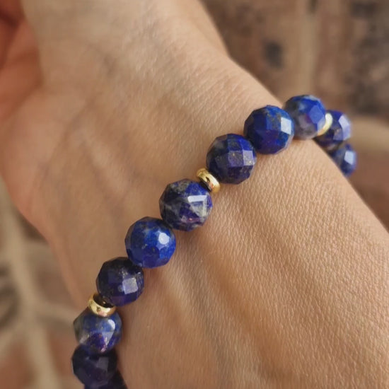 Close-up video of natural Lapis Lazuli and gold plated stretch bracelet – healing gemstone jewellery
