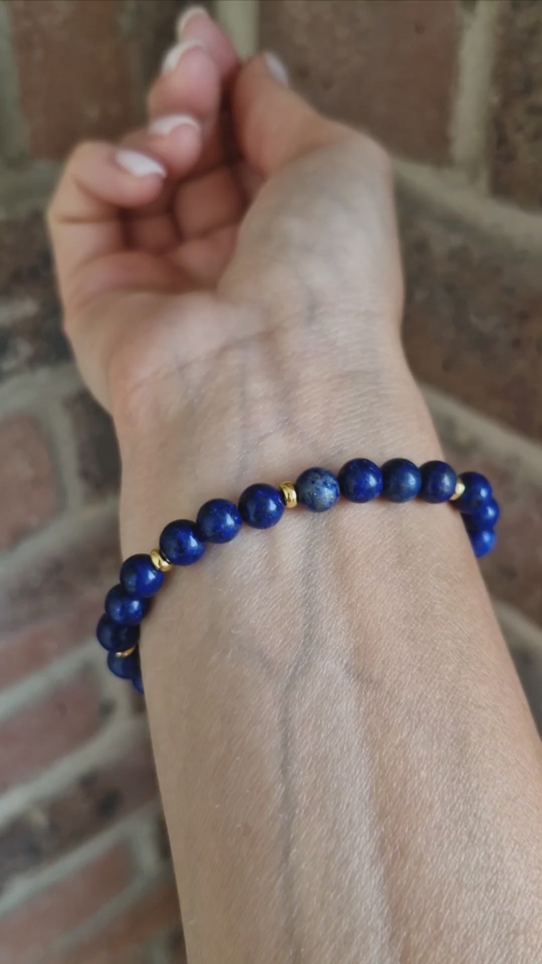 Video showing Lapis gemstone stretch bracelet with 4mm 18K gold-plated disk beads